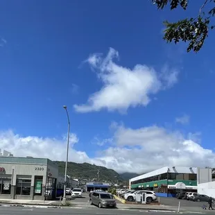 Office/retail spaces line the parking lot (mountain to ocean)