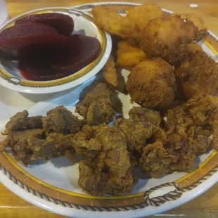 Fried chicken livers with hushpuppies, fried squash and beets