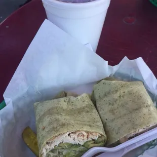 Smoked turkey, avocado and cheese with sprouts wrap, with a spinach tortilla