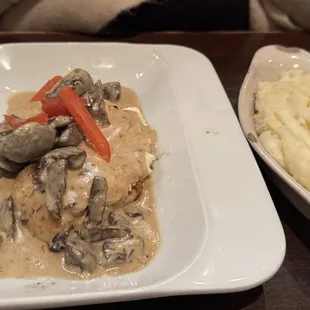 Chicken with Asiago sauce, toughest bird and most overcooked chicken we have ever had.