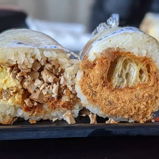 Spicy fan tuan (bean curd, egg, pork floss) and original (Chinese donut, pork floss, pickled veggies)