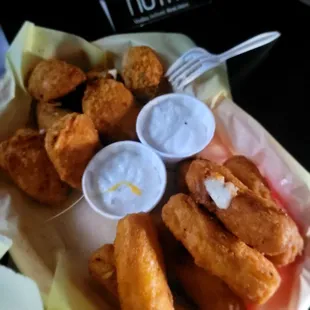 Fried mozzarella sticks and poppers.... hot and crispy and hit the spot!!