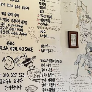 a wall covered in writing