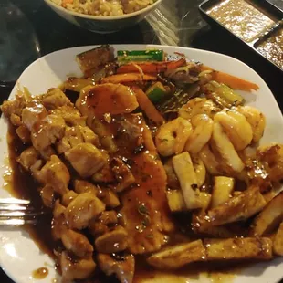 Chicken, salmon, calamari, shrimp, veggies, fried rice.