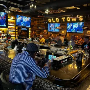 a man sitting at the bar