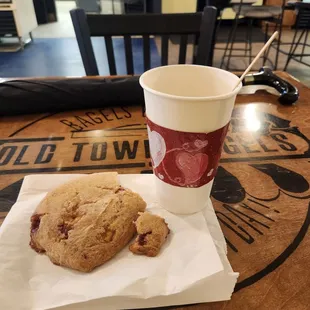 Rasberry scone and their amazing coffee locally made.