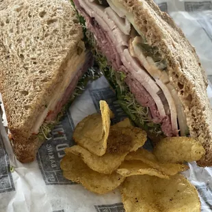 Honey Wheat Bread, Turkey, Roast Beef, Spinach, Sprouts, Jalapeños, Pepperocini&apos;s, Spicy Mayo &amp; Cucumbers with jalapeño kettle chips.