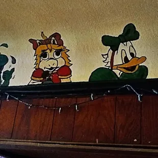 cartoon characters painted on the wall