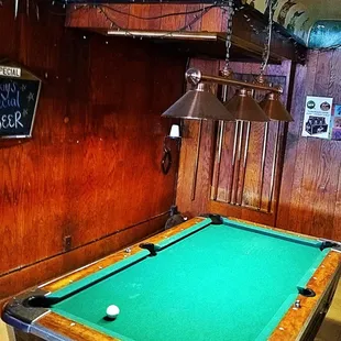 a pool table in a pub