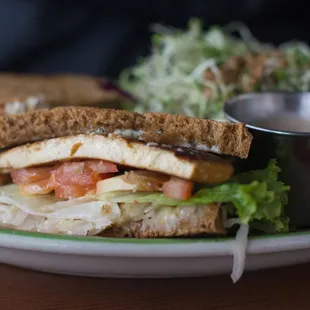 a sandwich and salad on a plate