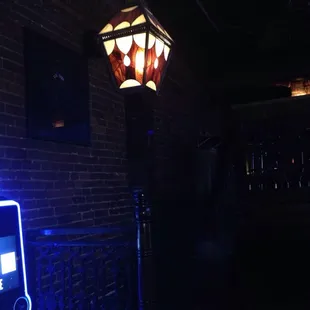 a street light in a dark alley