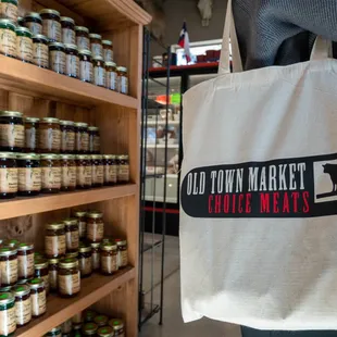 a man holding a grocery bag