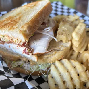 Turkey club in sourdough.