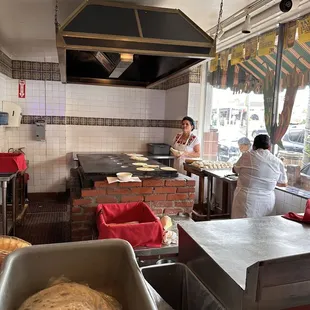 Ladies making fresh tortillas