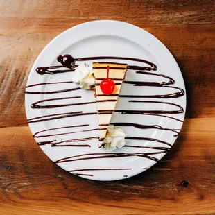 a slice of cheesecake on a white plate