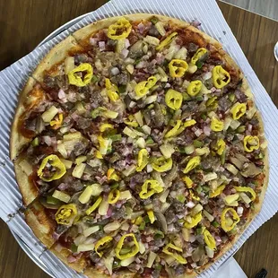 Large Our Town Pizza with no olives and pineapple added