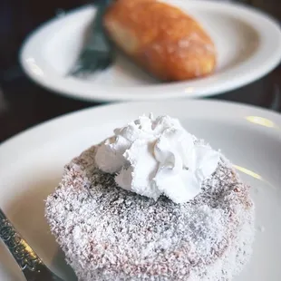 a plate of pastries and a fork