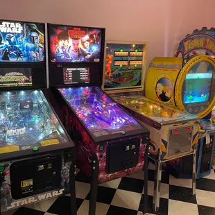 a row of pinball machines