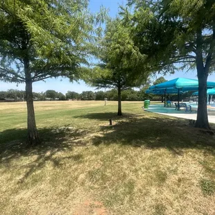 Huge field behind splash pad