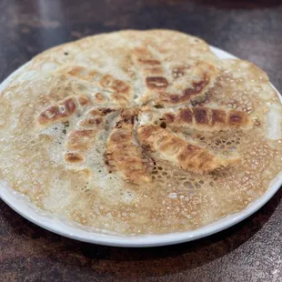 Pan Fried Dumplings! Get these! Uniquely prepared and the best I ever had!