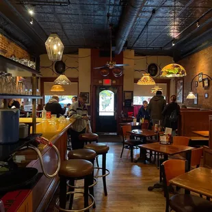 people sitting at the bar