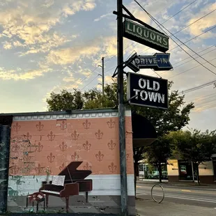 a grand piano painted on the side of a building