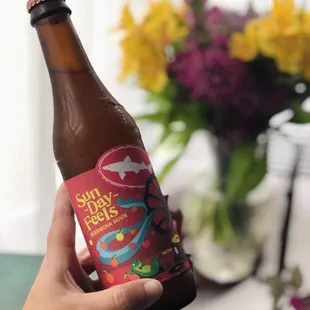 a person holding a bottle