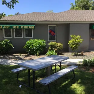 a picnic table and benches