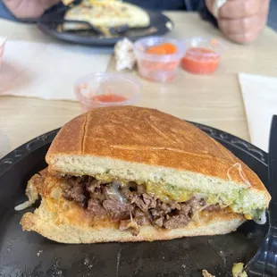 a man eating a sandwich