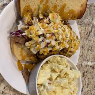 BBQ sandwich with Bryce's signature sauce and potato salad