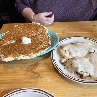 One pancake and biscuits and crazy with sausage.