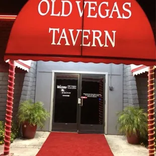 the entrance to the old vegas tavern