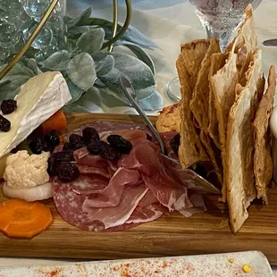 Charcuterie board -yes those are raisins not even dates Not worth $18