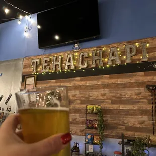 Beer and indoor sign.