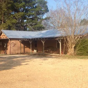 Looks like a House but if zoom in on this photo on the left side you will see the signs