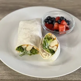 Our buffalo chicken wrap with a side of fresh fruit