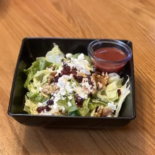 The cranberry walnut salad is a must try on our menu, recommended with the raspberry vinaigrette dressing.