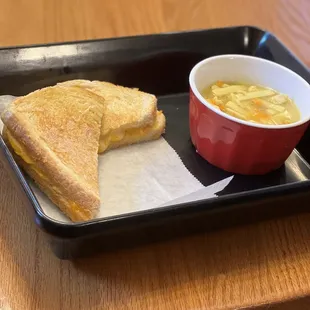 Our grilled cheese and a cup of chicken and noodle soup