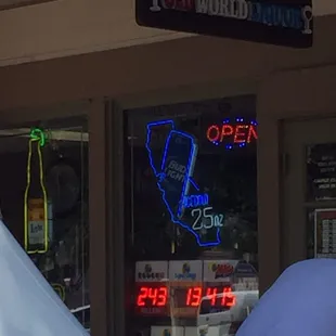 a neon sign in the window