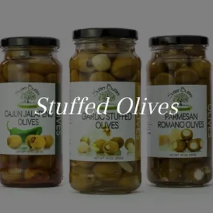 three jars of stuffed olives
