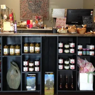 a shelf of jars and jars