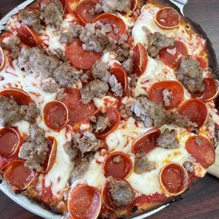 Gluten free Italian sausage and pepperoni pizza.