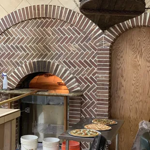 Their pizza oven is a wonder for the eyes and the bellows is an actual and authentic antique!