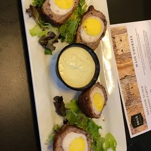 Scotch Eggs with homemade mustard dipping sauce. (Sauce was delicious)