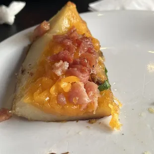 Part of a potato skin. Long wedges