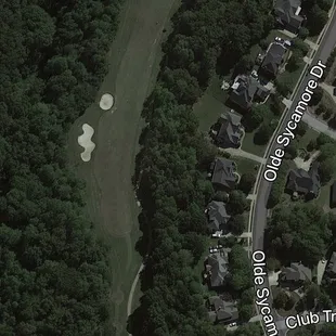 Layout of a hole number three where the traps on the left force golfers to the right.
