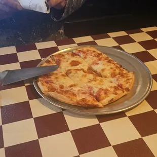 This pizza was $14. Looks to be about 8&quot;. I can buy 2 slices of pizza for half that price which are bigger and taste better elsewhere.