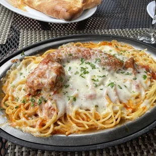 Lunch Special: Baked Spaghetti with Italian sausage and meat ball.