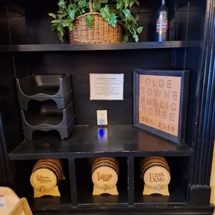 a shelf of barrels