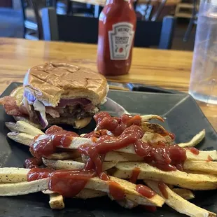 Single Smash Burger with cheese, a slice of bacon, tomato and mayo with hand cut fries